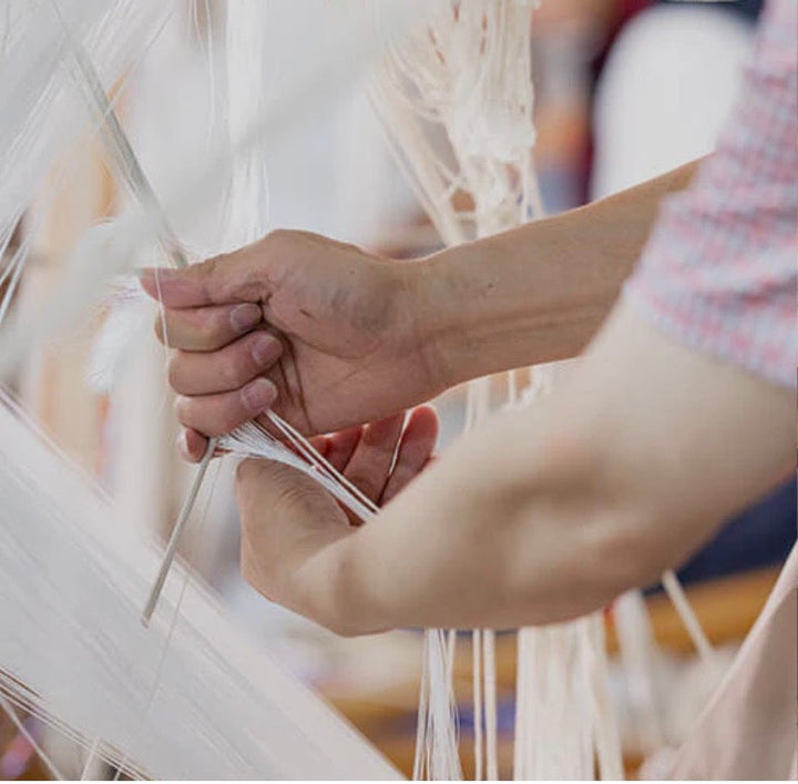 The Hands Behind the Silk Craft